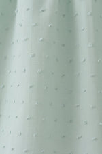 Green swiss dot cross sheep ruffle dress