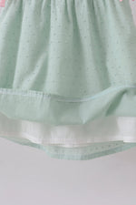 Green swiss dot cross sheep ruffle dress