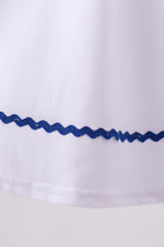 White flag smocked ruffle dress