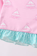 Pink sailboat print ruffle rashguard set